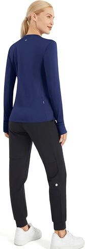 قميص رياضي نسائي من JOYSPELS مصنوع من الصوف الحراري ورقبة وهمية وأكمام طويلة للتمرين مع جيب بسحّاب بفتحات إبهام للجري in Kuwait