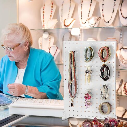 حامل عرض Pegboard محمول، حامل عرض مجوهرات Pegboard معدني قوي، حامل عرض مجوهرات Pegboard على سطح الطاولة مع 12 خطافًا للبوتيك، ومتاجر البيع بالتجزئة، وأحداث البائعين 17 بوصة × 13 بوصة، أسود in Kuwait