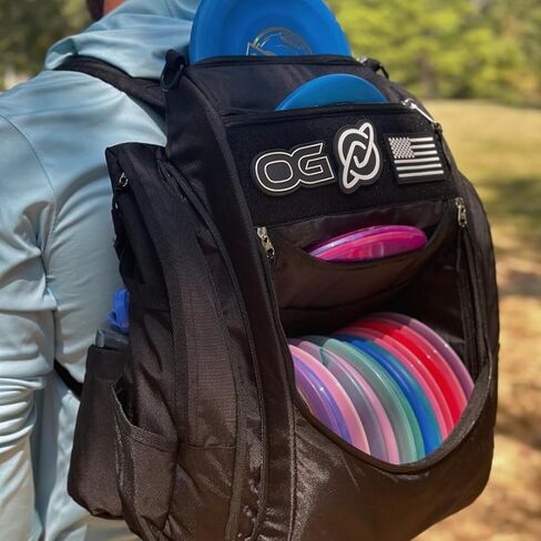 Discology Disc Golf OG V2 Grey & Black Disc Golf Bag | 26+ Disc Capacity | Premium Disc Golf Backpack Bag | Durable Design | 2 Large Side Compartments | Two Patches Included - Flag Patch Not Included in Saudi Arabia