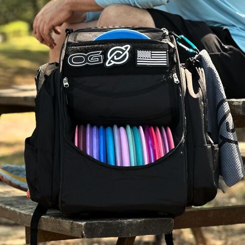 Discology Disc Golf OG V2 Grey & Black Disc Golf Bag | 26+ Disc Capacity | Premium Disc Golf Backpack Bag | Durable Design | 2 Large Side Compartments | Two Patches Included - Flag Patch Not Included in Saudi Arabia