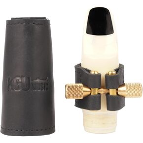 رباط جلدي وقبعة جلدية لألتو ساكسفون من KGUmusic. ملحقات الساكسفون ألتو. جلد أسود، حجر نوميتي طبيعي مرصع بمسمار من النحاس الخام (نحاس خام، مارسالا + جابسر أحمر) in Kuwait