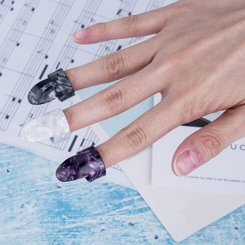 مجموعة 20 قطعة من أعواد الجيتار تتضمن 9 قطع من أعواد السبابة، و3 قطع من أعواد الإبهام، و8 قطع من أعواد الجيتار 0.46 مم للجيتار والقيثارة (ألوان مختلطة) - ملحقات الجيتار والباس، وواقي أصابع الجيتار in Kuwait