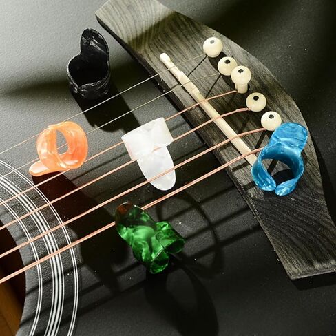 مجموعة 20 قطعة من أعواد الجيتار تتضمن 9 قطع من أعواد السبابة، و3 قطع من أعواد الإبهام، و8 قطع من أعواد الجيتار 0.46 مم للجيتار والقيثارة (ألوان مختلطة) - ملحقات الجيتار والباس، وواقي أصابع الجيتار in Kuwait
