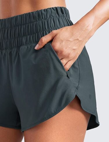 CRZ YOGA High Waisted Dolphin Running Shorts for Womens Mesh Liner Gym Workout Athletic Shorts with Zipper Pocket in Kuwait