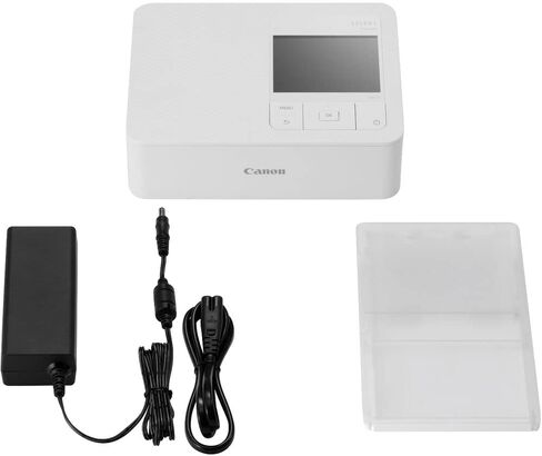 طابعة الصور المدمجة SELPHY CP1500 من Canon (أبيض) (5540C002) مجموعة ورق وأحبار ملونة KP-108IN + بطاقة ذاكرة Ultra سعة 64 جيجابايت + طقم تنظيف + محفظة بطاقة ذاكرة + قارئ بطاقات in Kuwait