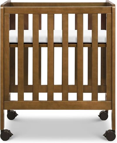 Carter's by daVinci Colby Grow 6-in-1 Convertible Bassinet to Crib in Walnut, GREENGUARD Gold Certified, Removable Wheels in Kuwait