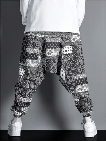GORGLITTER Men's Baggy Stacked Sweatpants Y2K Wide Leg Flared Graphic Paisley Pants with Pocket in Saudi Arabia