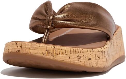 صندل نسائي من FitFlop مصنوع من الجلد ذو شكل F-Twist ذو مقدمة مسطحة (فلين) ويدج in Saudi Arabia