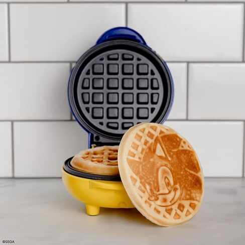 Uncanny Brands Cookie Monster Mini Waffle Maker - Sesame Street Kitchen Appliance in Kuwait