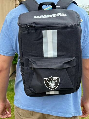 New York Giants 36 Can NFL Cooler Backpack – Portable Soft Sided Ice Chest – Insulated Bag Holds 36 Cans Plus a Wine Bottle or Water Bottle and a Phone and Wallet - Officially Licensed Fan Gear in Saudi Arabia