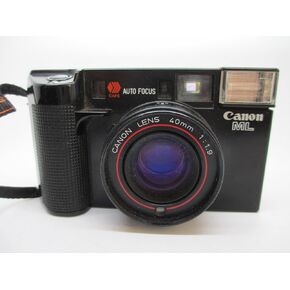 Canon AF35ML Point and Shoot 35MM Film Camera with built in Flash and autofocu lens. Power rewinder and film loader, 40MM F1.9 Canon lens. (Renewed)