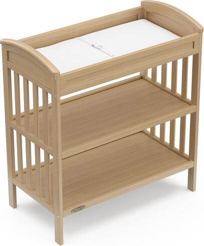 Graco Benton Changing Table with Water-Resistant Changing Pad, Driftwood | GREENGUARD Gold Certified, Includes Diaper Change Pad with Safety Strap, 2 Open Storage Shelves for Organizing in Saudi Arabia