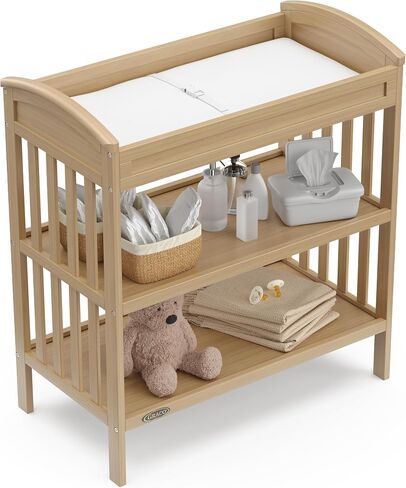 Graco Benton Changing Table with Water-Resistant Changing Pad, Driftwood | GREENGUARD Gold Certified, Includes Diaper Change Pad with Safety Strap, 2 Open Storage Shelves for Organizing in Saudi Arabia