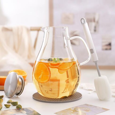 Glass Pitcher with Lid, 70oz/2 Liter Glass Water Jug with Coaster and Brush,Heat and Cold Resistance for Coffee, Juice, Hot/Cold Beverages,Lemonade and Milk in Saudi Arabia