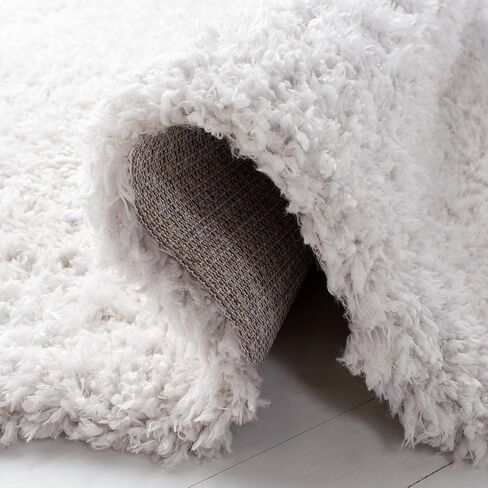 SAFAVIEH Flokati Collection 2'2" x 8' Ivory FLK310A 2.3-inch Thick Runner Rug in Saudi Arabia