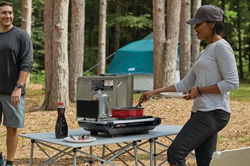 Coleman Tabletop 2-in-1 Grill & Stove with 2 Adjustable Burners, Propane Grill/Stove with Push-Button Starter, Wind Guards, Grease Tray, & 20,000 BTUs of Power for Camping, Tailgating, & More in Saudi Arabia