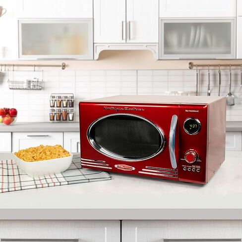 Nostalgia RMO4RR Retro Large 0.9 cu ft, 800-Watt Countertop Microwave Oven, 12 Pre-Programmed Cooking Settings, Digital Clock, Easy Clean Interior, Metallic Red in Saudi Arabia