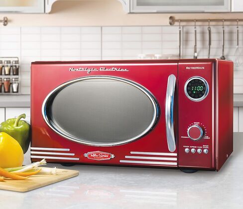 Nostalgia RMO4RR Retro Large 0.9 cu ft, 800-Watt Countertop Microwave Oven, 12 Pre-Programmed Cooking Settings, Digital Clock, Easy Clean Interior, Metallic Red in Saudi Arabia
