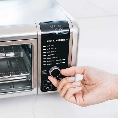 Ninja FT205CO Digital Air Fry Pro Countertop 10 في 1 فرن مع ارتفاع ممتد، سعة XL، تخزين قابل للطي والبعيد، مع سلة قلي الهواء، مقلاة ورق، رف شواء، رف سلكي وصينية فتات، فضي (متجدد) in Kuwait
