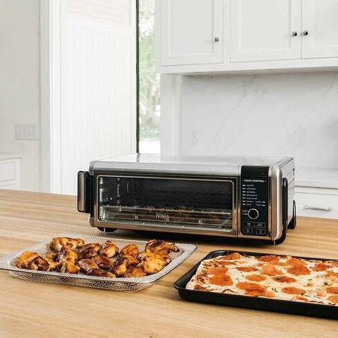 Ninja FT205CO Digital Air Fry Pro Countertop 10 في 1 فرن مع ارتفاع ممتد، سعة XL، تخزين قابل للطي والبعيد، مع سلة قلي الهواء، مقلاة ورق، رف شواء، رف سلكي وصينية فتات، فضي (متجدد) in Kuwait