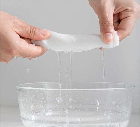 100PCS disposable compressed towel slices, compact travel towel for outdoor travel, camping, home, and simplified travel, ready to use, portable and independent packaging, white in Saudi Arabia