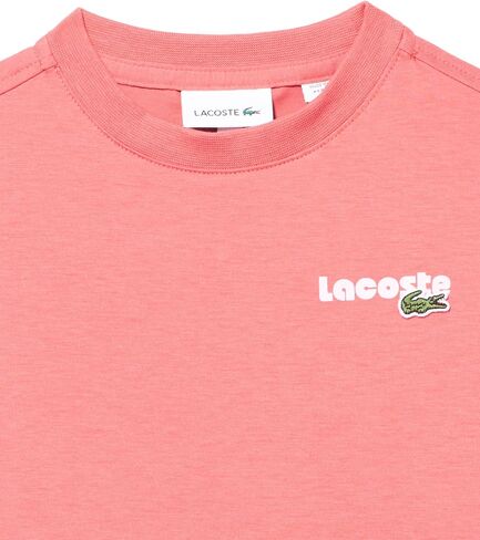 تي شيرت Lacoste بأكمام قصيرة ورقبة دائرية وكلمات كبيرة ورسومات ملونة in Saudi Arabia