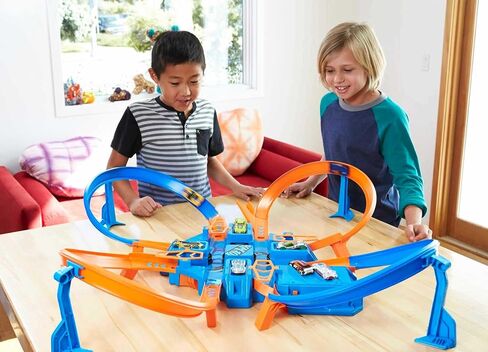 Hot Wheels Toy Car Track Set, Criss Cross Crash with 1:64 Scale Vehicle, Powered by a Motorized Booster (Amazon Exclusive) in Saudi Arabia