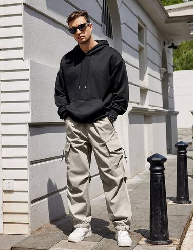 COOFANDY Men's Baggy Cargo Pants Trendy Casual Parachute Pant Loose Fit Harem Joggers with Pockets in Saudi Arabia