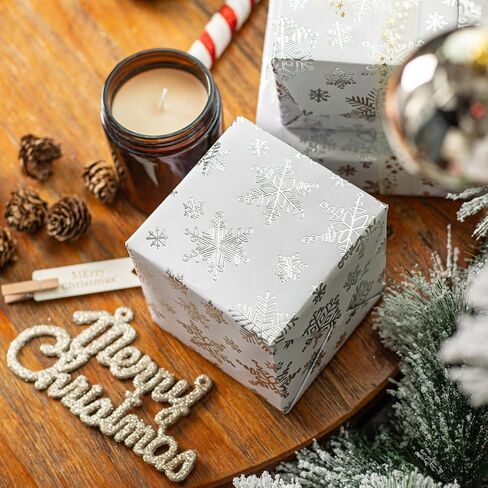 Homeral Christmas Wrapping Paper Roll - 46.8sq.ft. 3D Embossed Silver Foil Snowflakes on White for Christmas, Winter Holiday, Party, New Year Celebration- 17in x 33ft in Saudi Arabia