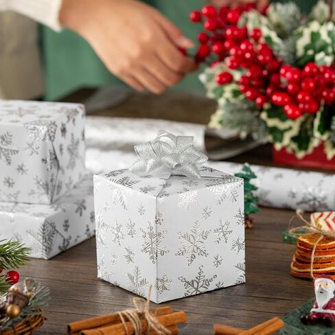 Homeral Christmas Wrapping Paper Roll - 46.8sq.ft. 3D Embossed Silver Foil Snowflakes on White for Christmas, Winter Holiday, Party, New Year Celebration- 17in x 33ft in Saudi Arabia