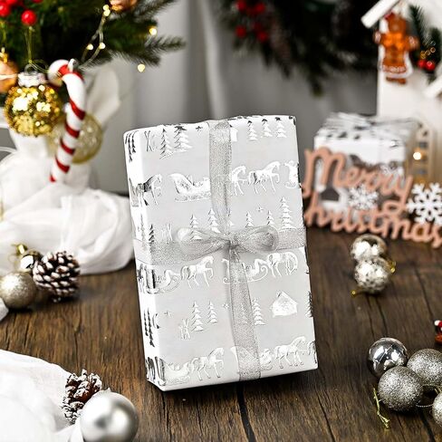 Homeral Christmas Wrapping Paper Roll - 46.8sq.ft. 3D Embossed Silver Foil Snowflakes on White for Christmas, Winter Holiday, Party, New Year Celebration- 17in x 33ft in Saudi Arabia