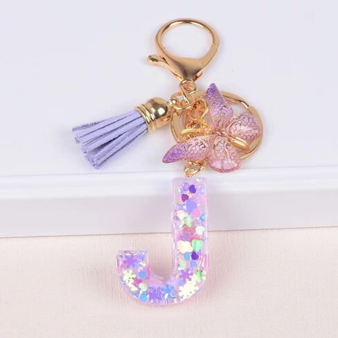 Purple Tassel Butterfly Initial Pendant, Women's Wallet Backpack Handbag Keychain. Resin love sequin initials key chain in Saudi Arabia