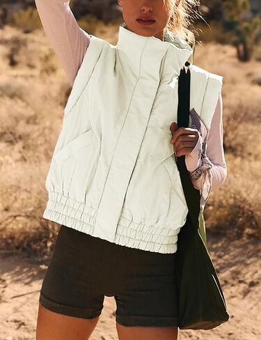 سترة منتفخة للنساء من Lviefent سترة خفيفة الوزن ومبطنة بأزرار سفلية بدون أكمام ومعطف جيليه مبطن مع جيوب in Saudi Arabia