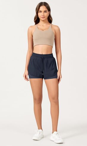 ODODOS 2 in1 Athletic Shorts for Women High Waist Dolphin Split Workout Running Shorts with Pockets in Kuwait