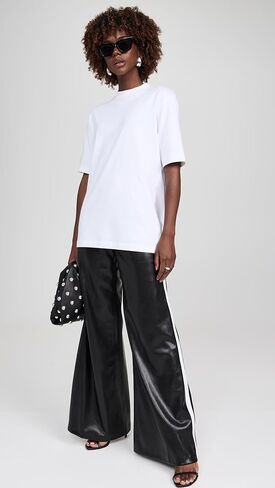 بنطال Alice + olivia من الجلد النباتي للنساء مع شريط سباق من Alice + olivia in Kuwait