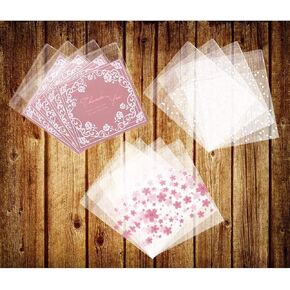 حقيبة حلوى ذاتية اللصق 300 قطعة 3 أنماط مختلفة أكياس كوكيز بلاستيكية ذاتية اللصق 100 قطعة من أكياس أزهار الكرز، 100 قطعة من أكياس الورد الوردي و100 قطعة من أكياس البولكا المنقطة البيضاء هدية حقيبة بلاستيكية يمكنك صنعها بنفسك in Kuwait