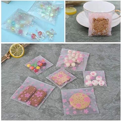 حقيبة حلوى ذاتية اللصق 300 قطعة 3 أنماط مختلفة أكياس كوكيز بلاستيكية ذاتية اللصق 100 قطعة من أكياس أزهار الكرز، 100 قطعة من أكياس الورد الوردي و100 قطعة من أكياس البولكا المنقطة البيضاء هدية حقيبة بلاستيكية يمكنك صنعها بنفسك in Kuwait