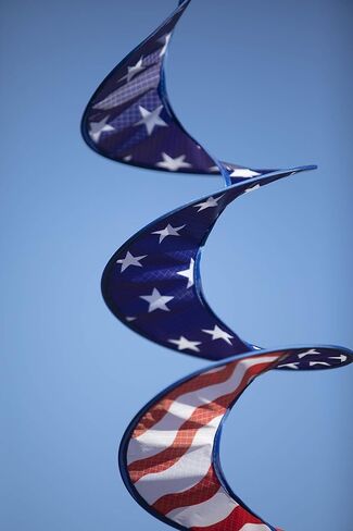 In the Breeze 5175 24" Stars and Stripes Curlie Spinner-Outdoor Hanging Decoration in Saudi Arabia