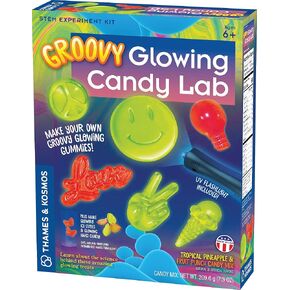 Thames & Kosmos Groovy Glowing Candy Lab STEM Kit | Make Glow-in-the-Dark Candies, Ice Cubes | Explore Luminescence & Chemistry of Gummies | Cool Shapes, Flavors, Safe to Eat | Includes LED Flashlight
