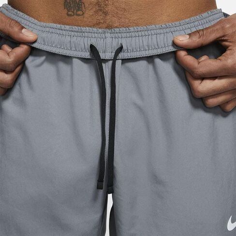 بنطال الجري المنسوج للرجال من Nike Dri-FIT Challenger (رمادي دخاني/فضي عاكس، DD4894-084) مقاس XX-Large in Saudi Arabia