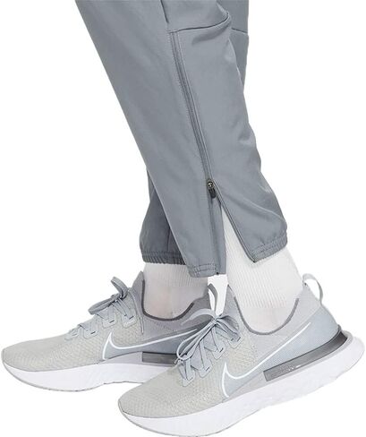 بنطال الجري المنسوج للرجال من Nike Dri-FIT Challenger (رمادي دخاني/فضي عاكس، DD4894-084) مقاس XX-Large in Saudi Arabia