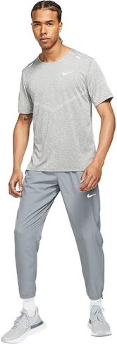 بنطال الجري المنسوج للرجال من Nike Dri-FIT Challenger (رمادي دخاني/فضي عاكس، DD4894-084) مقاس XX-Large in Saudi Arabia