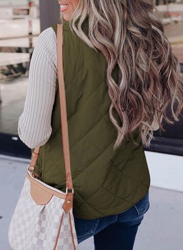 SHEWIN Women Puffer Vest Casual Stand Collar Sleeveless Puffer Jacket Warm Winter Reversible Zip Up Outerwear with Pockets in Saudi Arabia