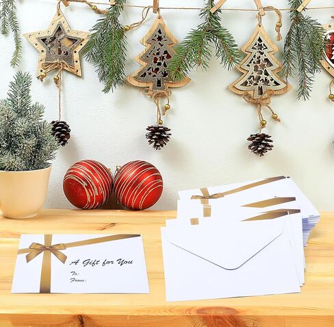 100 Mini Christmas Card Gift Envelopes Holiday Card Gift Holder Enclosure Gold Bow Design Size 2 11/16" X 3 11/16" for Place Cards, Gift Cards, Notes, Money and Flower Arrangement Cards Party Favor in Saudi Arabia