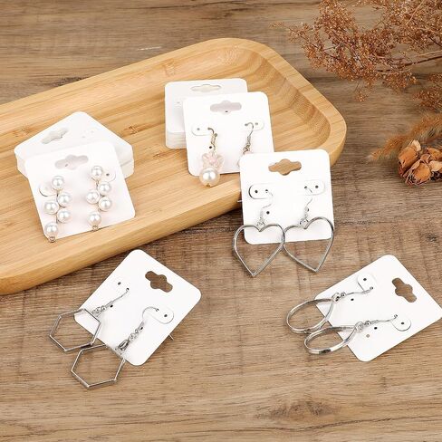 Hariendny 100 PCS White Earring Display Holder Cards 2" Earring Display Card for Display 6 Holes Blank Paper Cards Earring Cards Jewelry Display Cards for Hanging Earrings Jewelry Holder Cards in Saudi Arabia