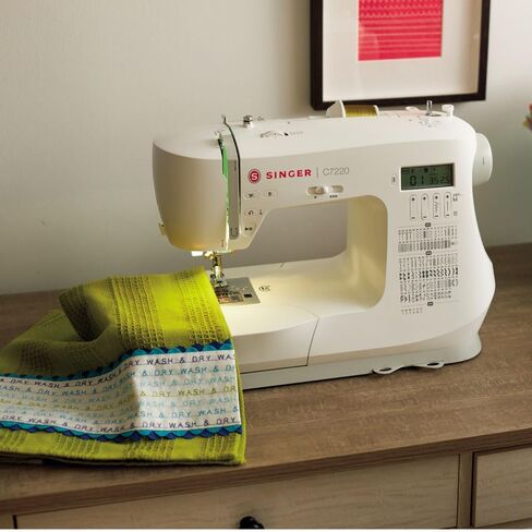 SINGER C7220 Computerized Sewing Machine with Extension Table & Accessory Kit | 200 Built-in Stitches, 8 One-step Buttonhole Styles, Alphabet Font, Speed Control Lever & LCD Screen in Saudi Arabia