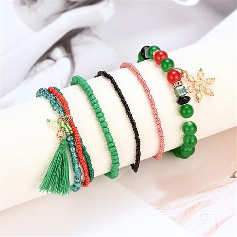 7 Pcs/Set Christmas Multi Color Stretch Beaded Charm Stackable Bracelet Xmas Jingle Bell Snowman Santa Claus Crutches Pendant Beaded Bracelets Adjustable Stretch Strand Elastic Bracelets Jewelry in Saudi Arabia