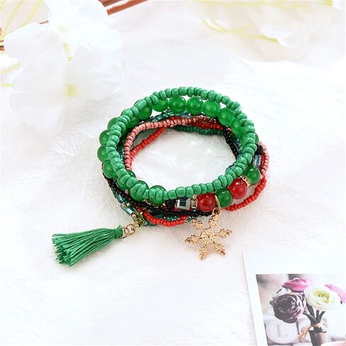 7 Pcs/Set Christmas Multi Color Stretch Beaded Charm Stackable Bracelet Xmas Jingle Bell Snowman Santa Claus Crutches Pendant Beaded Bracelets Adjustable Stretch Strand Elastic Bracelets Jewelry in Saudi Arabia
