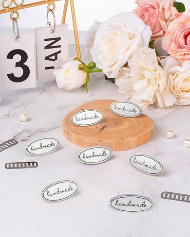 Megitzuu 12PCS Handmade Tags, Alloy Handmade Labels with Shims Colorful Alloy Hand Made Signs Oval Knitting Sewing Labels for Bags, Hats, Clothing, Handmade Items, Crochet Supplies (Silver) in Saudi Arabia