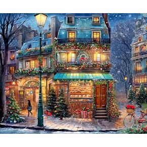 Springbok's Winter Wonderland Cafe 500 Piece Jigsaw Puzzle is a Picturesque Holiday Scene of a Cosy Cafe in The City